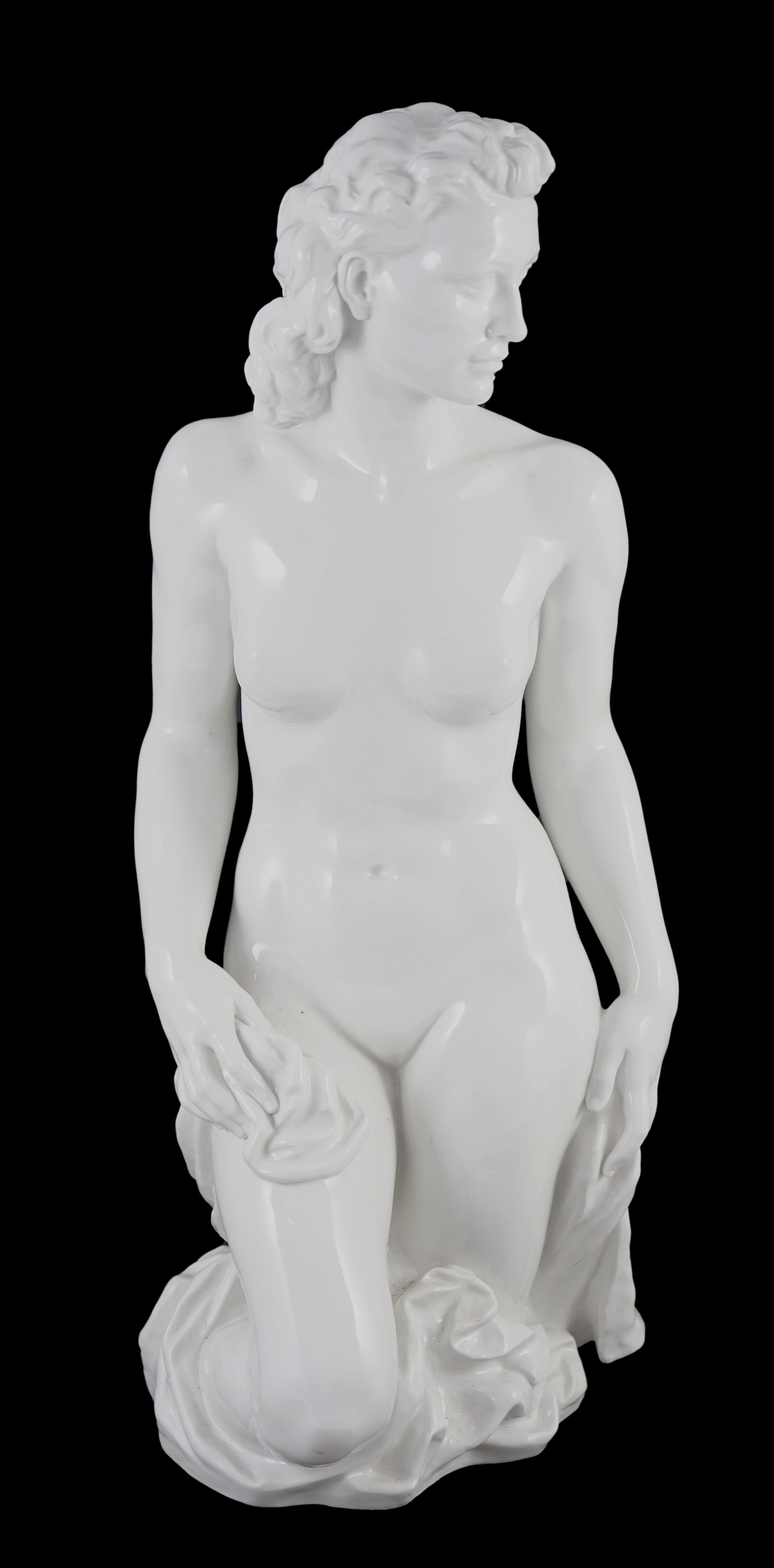 Robert Ullmann (1903-1966) for Meissen, a large white glazed porcelain three-quarter length figure of a nude woman, 50.5cm high